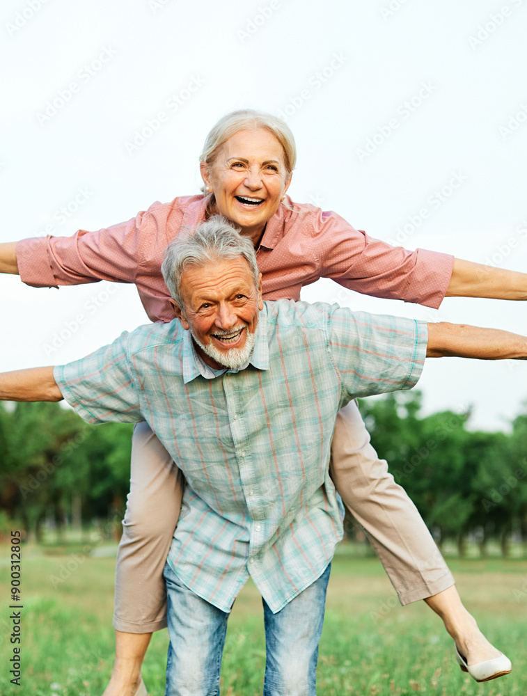 © Lumos sp - woman man outdoor senior couple happy lifestyle retirement together smiling love fun elderly active vitality nature mature portrait piggyback game © Lumos sp - woman man outdoor senior couple happy lifestyle retirement together smiling love fun elderly active vitality nature mature portrait piggyback game
