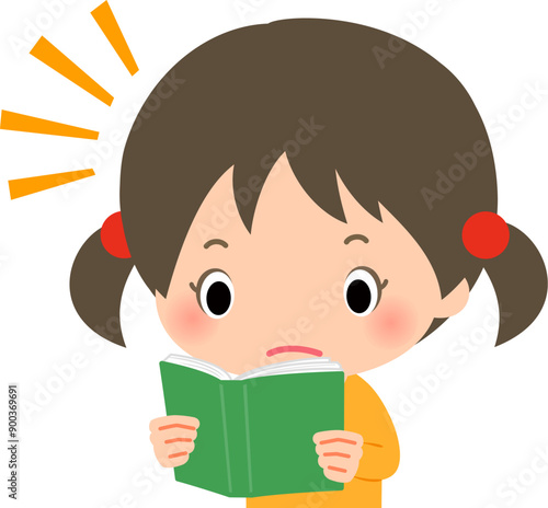 熱心に本を読む女の子