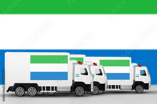 Sierra Leone flag depicted on side wall of white delivery van close up. Shipping and local delivery concept photo