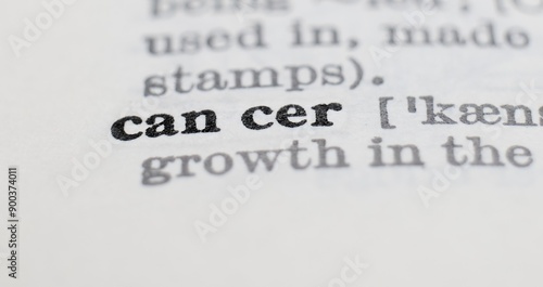 Cancer definition in the dictionary close-up, shallow depth of field and selective focus.