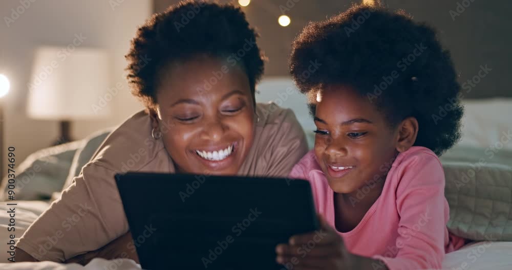 Mother, girl and tablet on bed for streaming, games or elearning in bedroom of home at night with smile. Black people, woman or child with touchscreen for movie, relax or online cartoon and happiness Mother, girl and tablet on bed for streaming, games or elearning in bedroom of home at night with smile. Black people, woman or child with touchscreen for movie, relax or online cartoon and happiness