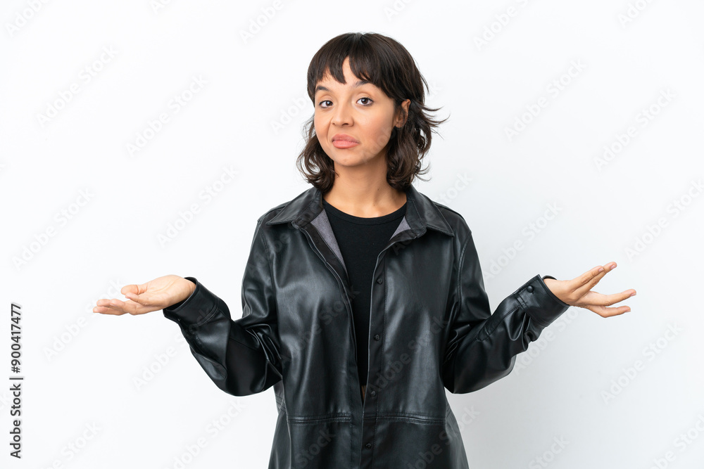 Young mixed race woman isolated on white background having doubts Young mixed race woman isolated on white background having doubts