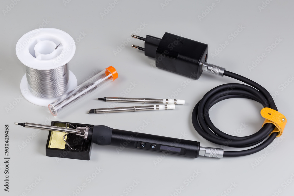 Electric smart soldering iron with power unit, replaceable tips, solder Electric smart soldering iron with power unit, replaceable tips, solder