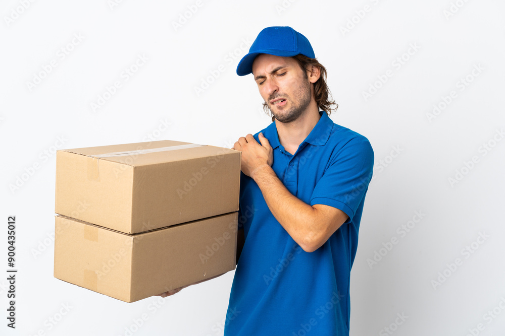 Delivery man isolated on white background suffering from pain in shoulder for having made an effort Delivery man isolated on white background suffering from pain in shoulder for having made an effort