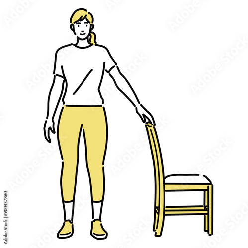 股関節体操をしている若い女性
