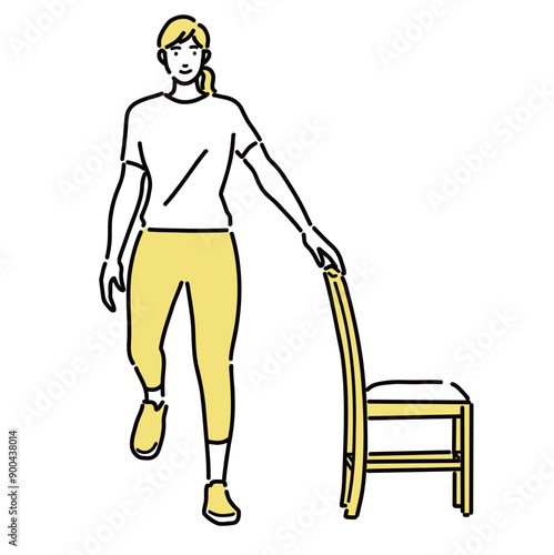 股関節体操で右足を曲げている若い女性
