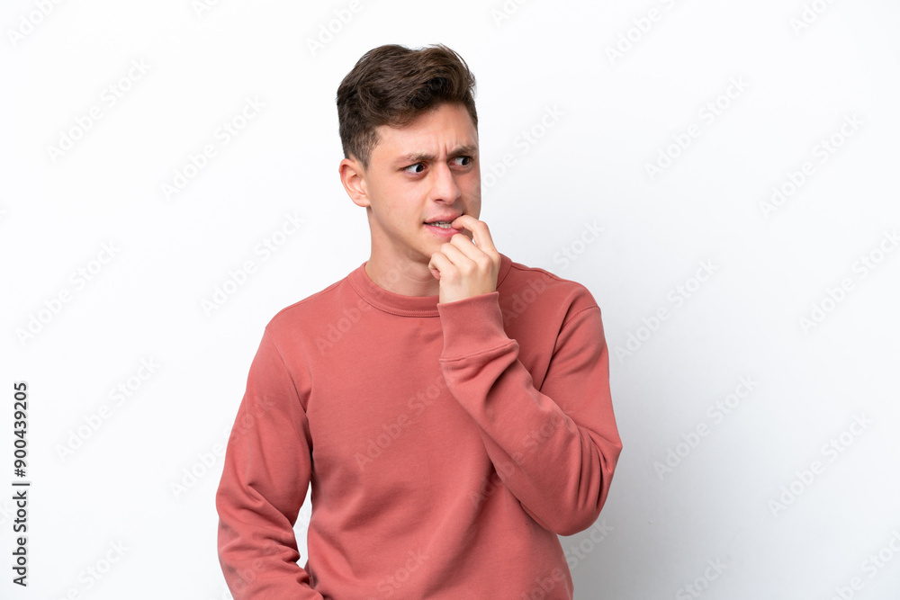 Young handsome Brazilian man isolated on white background nervous and scared Young handsome Brazilian man isolated on white background nervous and scared