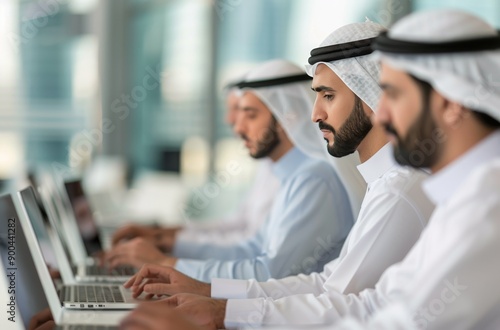 Men Working on Laptops in Office