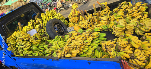 Banana selling at the wet market in Bogor city, west Java in Asia street market fruit vendor, public market situation in Asia for blog photo