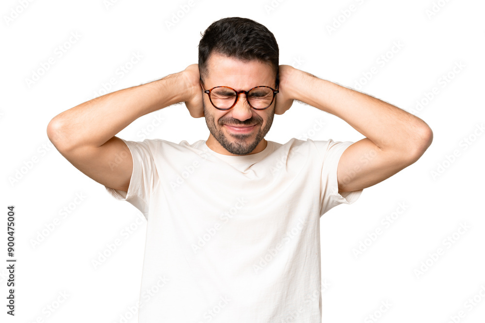 Young handsome caucasian man over isolated chroma key background frustrated and covering ears Young handsome caucasian man over isolated chroma key background frustrated and covering ears