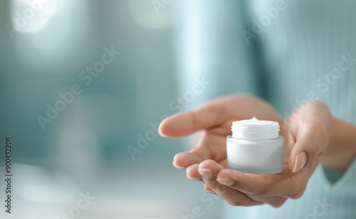 Woman Holding Skincare Jar
