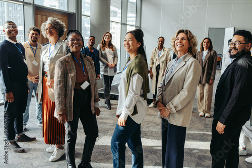 Fotografia Audience at a business seminar in the workplace looking happy and engaged