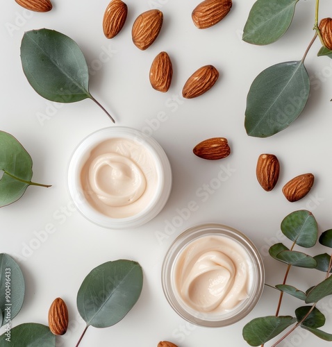 Almond Cream Jars on Marble Surface