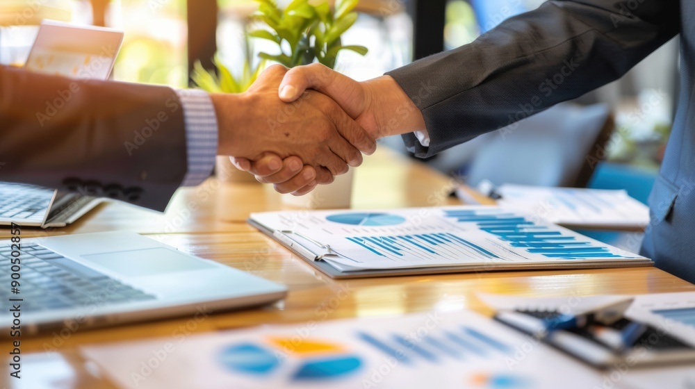 Close Up Business People Handshake the Agreement. Close Up Business People Handshake the Agreement.