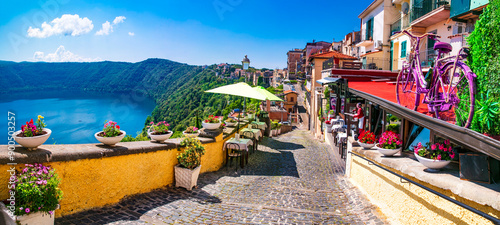 Fototapeta Naklejka Na Ścianę i Meble -  Most scenic lakes of Italy - volcanic Albano lake ,  charming floral streets of Castel Gandolfo village and crater of volcano. popular touristic site near Rome, famous as Pope residense