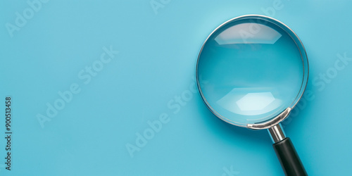 Wallpaper Mural Magnifying glass on turquoise background with copy space Torontodigital.ca