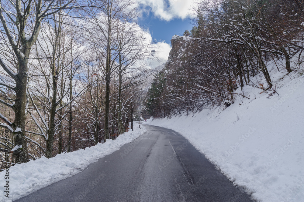 Mountain road in winter, Tanaro valley, Piedmont, Ligurian Alps, Italy Mountain road in winter, Tanaro valley, Piedmont, Ligurian Alps, Italy
