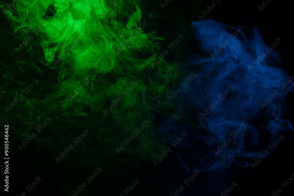 Green and pink steam on a black background. Green and pink steam on a black background.