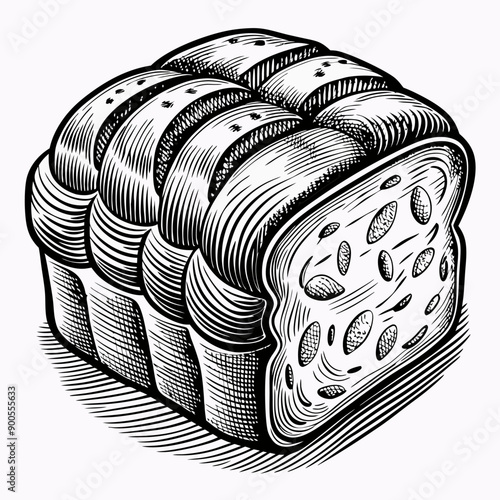 A close up of a loaf of bread with a few nuts on top