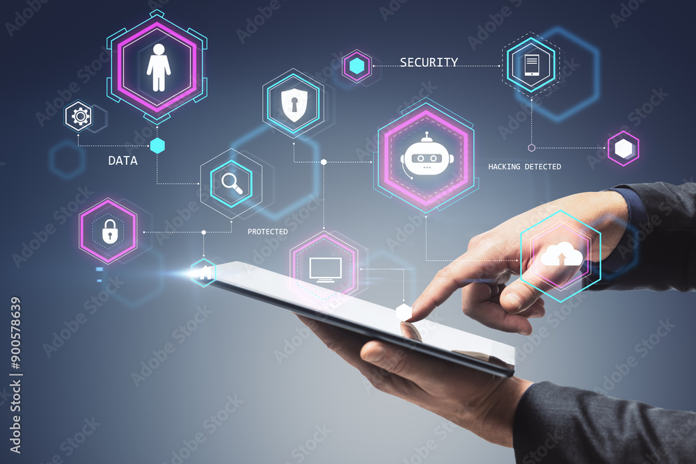 Man using a tablet with holographic security icons and connections on a dark background. Man using a tablet with holographic security icons and connections on a dark background.