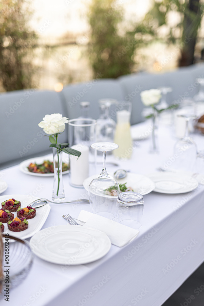 Beautiful table set for an event party or wedding reception . restaurant interior Beautiful table set for an event party or wedding reception . restaurant interior