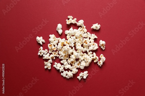 Delicious popcorn on a colored background