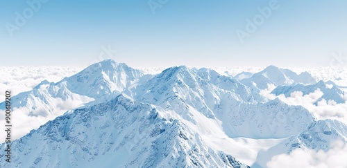 photo of mountains covered in snow with a bright blue sky in the background