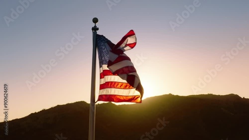 Aerial view of the American flag at sunrise symbolizing patriotism, independence, and pride on national holidays like July 4th and Presidents Day, reflecting the nations values and history