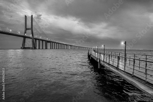 Rainy night image of the Vasco da Gama bridge from the Parque das Nações in Lisbon. photo