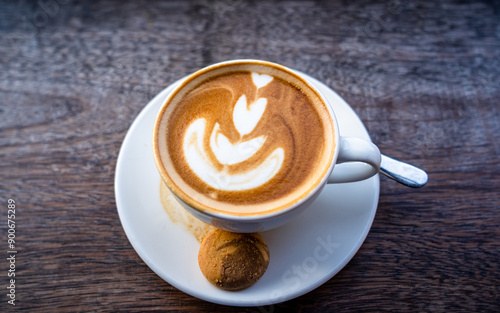 cup of cappuccino on table  photo