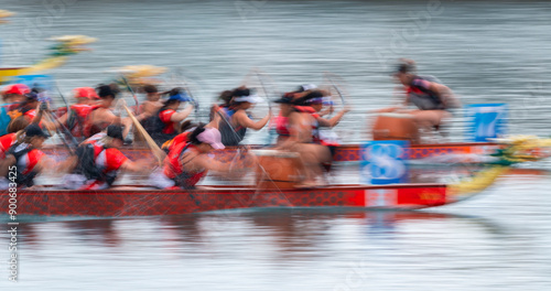 Bild auf Leinwand Traditional dragon boat racing, in China, coincides with the 5th day of the 5th Chinese lunar month