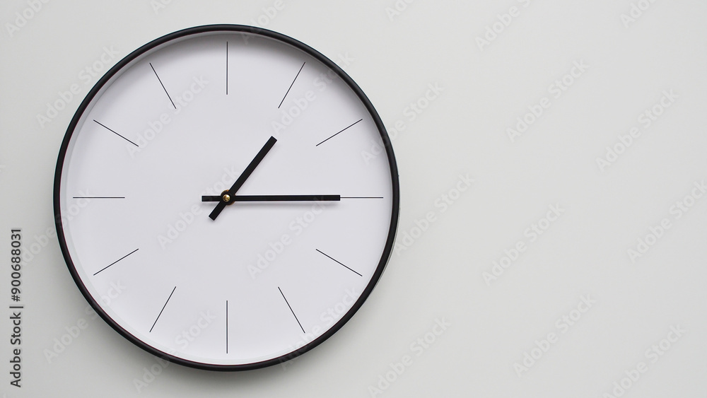 Wall Clock Showing 13.15/01.15 O'Clock on White Wooden Surface - Perfect for Time Management and Scheduling Concepts Wall Clock Showing 13.15/01.15 O'Clock on White Wooden Surface - Perfect for Time Management and Scheduling Concepts