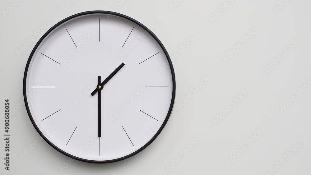 Wall Clock Showing 13.30/01.30 O'Clock on White Wooden Surface - Perfect for Time Management and Scheduling Concepts Wall Clock Showing 13.30/01.30 O'Clock on White Wooden Surface - Perfect for Time Management and Scheduling Concepts