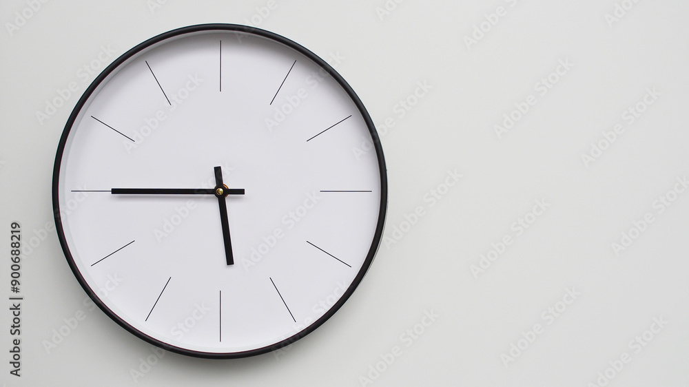 Wall Clock Showing 17.45/05.45 O'Clock on White Wooden Surface - Perfect for Time Management and Scheduling Concepts Wall Clock Showing 17.45/05.45 O'Clock on White Wooden Surface - Perfect for Time Management and Scheduling Concepts