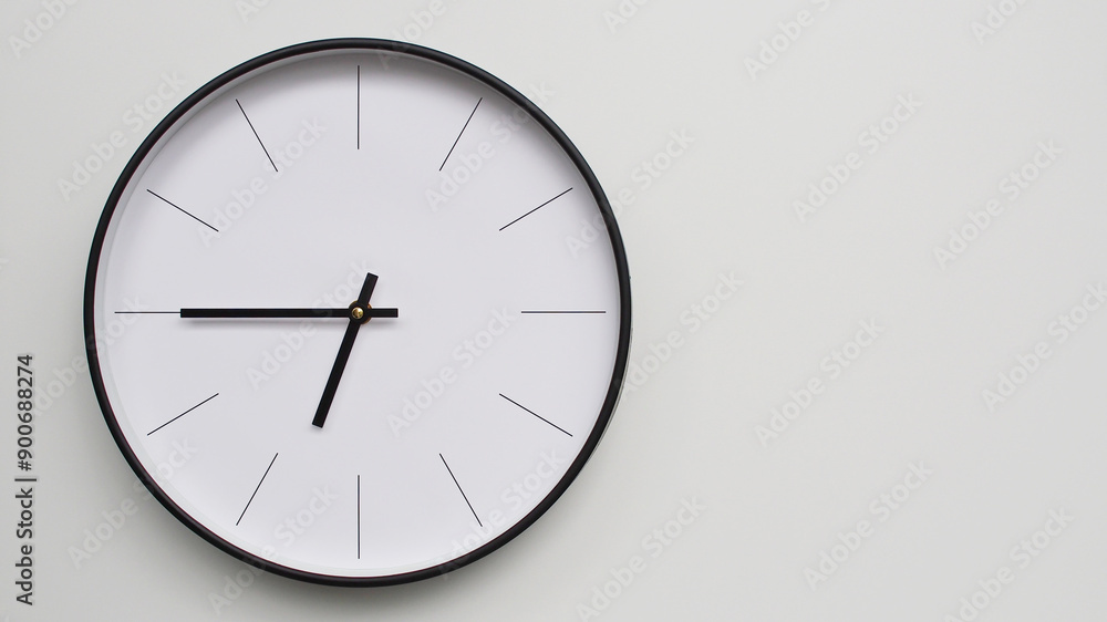 Wall Clock Showing 18.45/06.45 O'Clock on White Wooden Surface - Perfect for Time Management and Scheduling Concepts Wall Clock Showing 18.45/06.45 O'Clock on White Wooden Surface - Perfect for Time Management and Scheduling Concepts