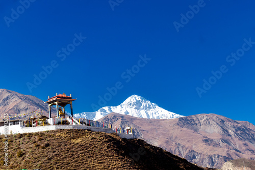 Statue of Siddhartha Gautam Buddha overlooking the Muktinath Village in Upper Mustang, Nepal