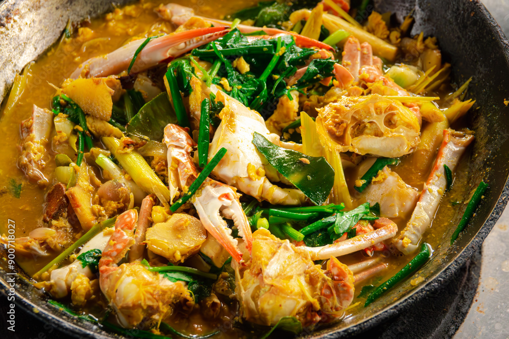 A bowl of food with shrimp and vegetables. The dish is full of color and looks delicious. The shrimp is cooked and the vegetables are fresh and crisp. The dish is served in a black pan A bowl of food with shrimp and vegetables. The dish is full of color and looks delicious. The shrimp is cooked and the vegetables are fresh and crisp. The dish is served in a black pan
