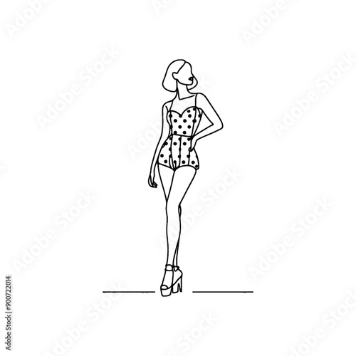 woman wearing retro fashion flirty polka dot romper with wedges