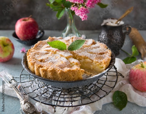 super realistic photo of a apple pie with apples all around in the kitchen - traditional polish apple pie . szarlotka photo