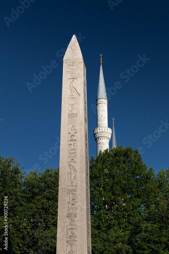 Ancient Egyptian Theodosius Obelisk, minarets of Blue Mosque clear sky at sunny day, Istanbul, Turkey photo