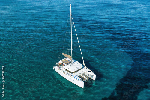 Corfu, 10 June 2024: Ionian Islands of Greece Corfu. Katamaran on blue water.