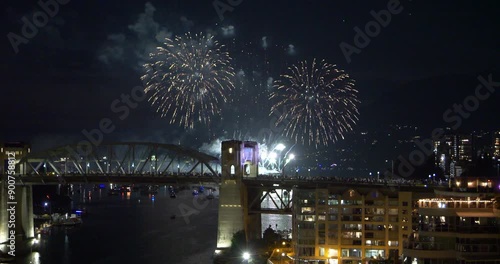 Fireworks in downtown Vancouver seen from the granville street bridge photo