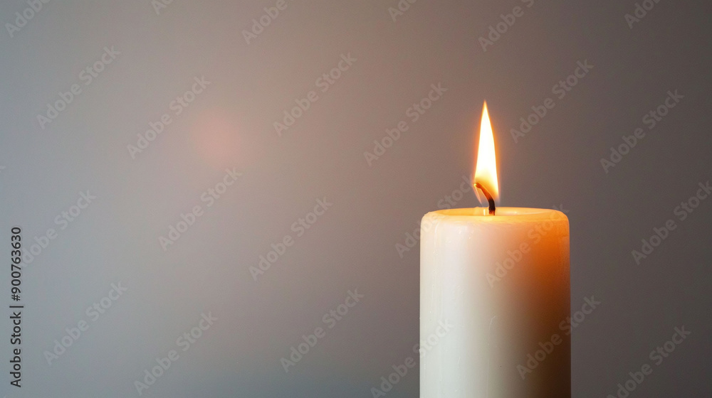 peaceful burning candle flame of fortitude on stark white background photo
peaceful burning candle flame of fortitude on stark white background photo