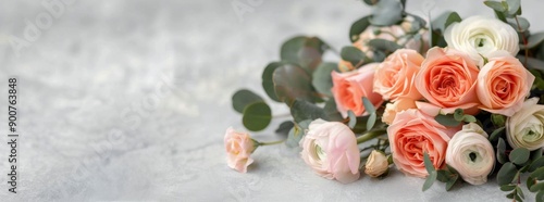 Peach and White Ranunculus Bouquet on Gray Background
