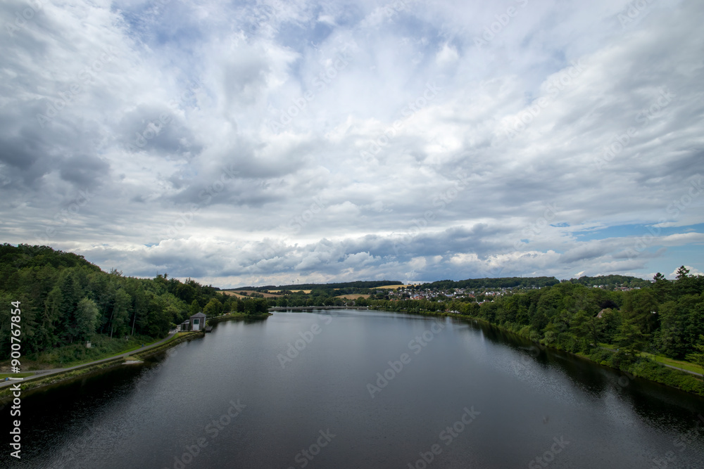 The pool below the Mohne Dam leading into the Mohne River in North Rhine-Westphalia, Germany The pool below the Mohne Dam leading into the Mohne River in North Rhine-Westphalia, Germany
