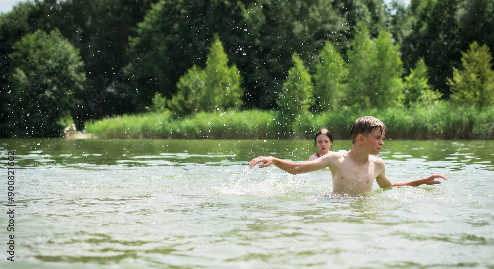 Children swim and play in the lake Children swim and play in the lake