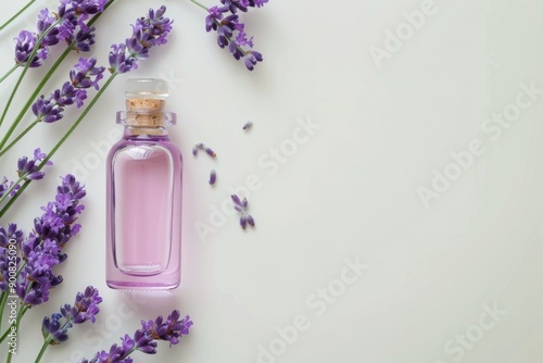 Lavender Oil Bottle and Flowers