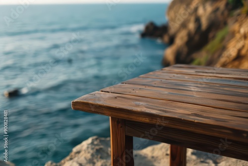A compact style wood table positioned by a seaside cliff