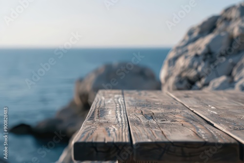 A compact style wood table positioned by a seaside cliff