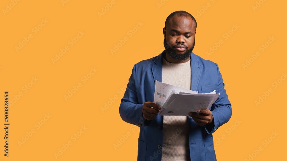 Accountant doing profit analysis for company, feeling perplexed by confusing data, studio background. Worker doing financial budgeting, scratching head, puzzled by financial figures, camera B Accountant doing profit analysis for company, feeling perplexed by confusing data, studio background. Worker doing financial budgeting, scratching head, puzzled by financial figures, camera B
